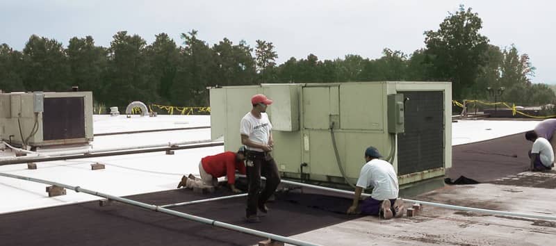 Contractors Installing a FiberTite Roofing System