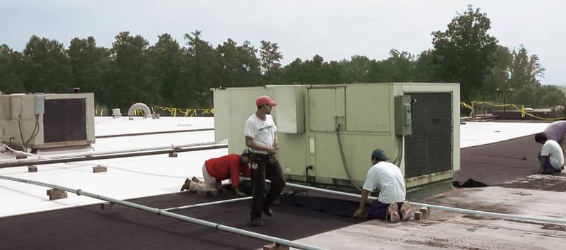 Contractors Installing a FiberTite Roofing System Contractors Installing a FiberTite Roofing System